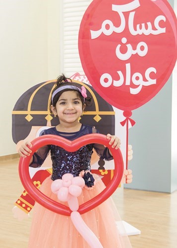 «الوطني» يُشارك الأطفال فرحة العيد في مستشفاه التخصصي