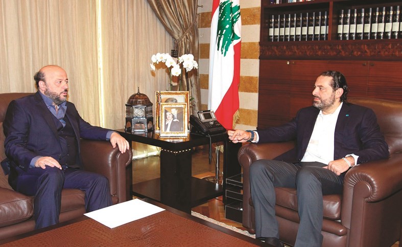 رئيس الحكومة المكلف سعد الحريري مستقبلا وزير الإعلام ملحم الرياشي في بيت الوسط	 (محمود الطويل)﻿