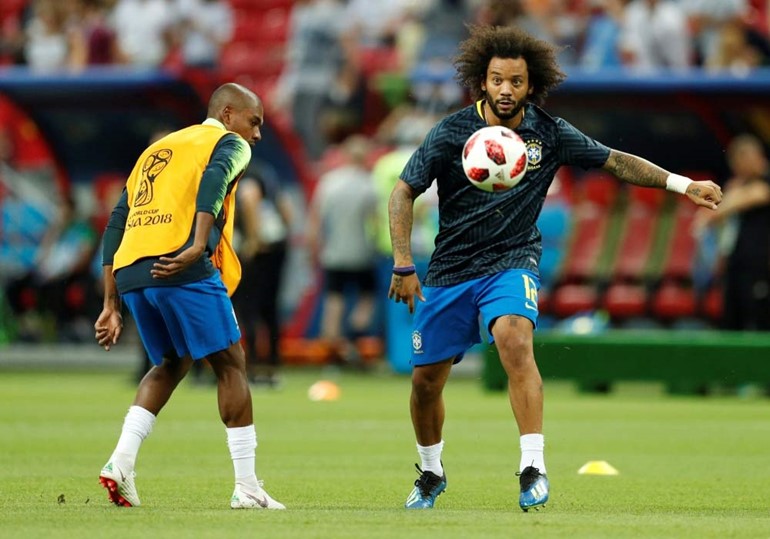 لاعب البرازيل ريناتو أجوستو يسجل هدف في مرمى بلجيكا