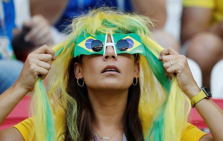 لاعب البرازيل ريناتو أجوستو يسجل هدف في مرمى بلجيكا