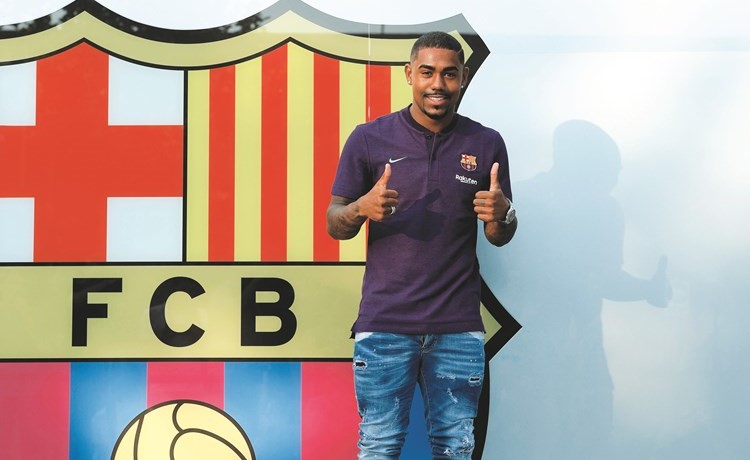 مالكوم سعيد بالتوقيع مع برشلونة (أ.ف.پ) 