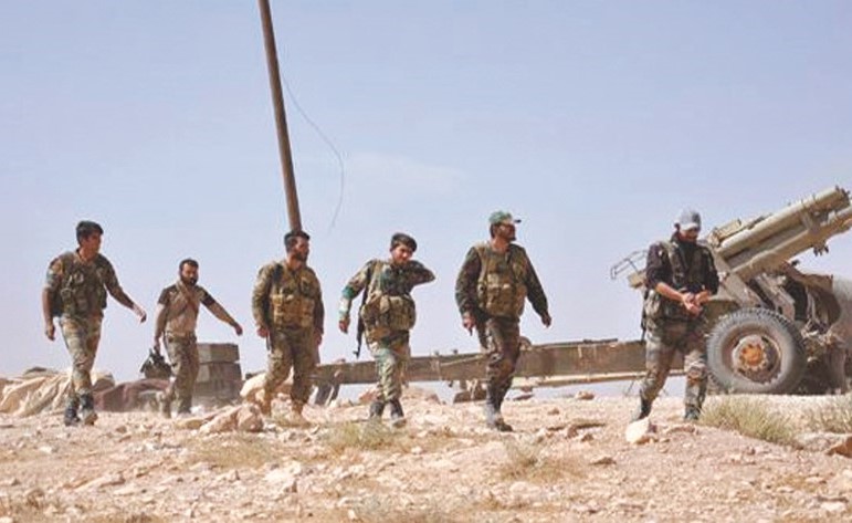 صورة وزعتها وكالة سانا لعناصر من الجيش في بادية السويداء ﻿