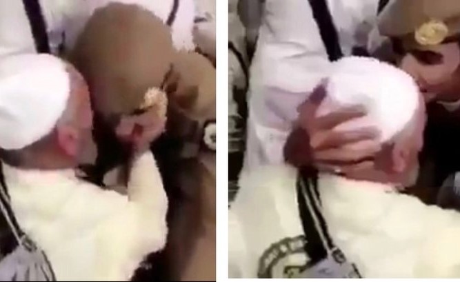 بالفيديو .. حاج مُسن يقبل جبين رجل أمن قام بمساعدته.. هنا الإحسان