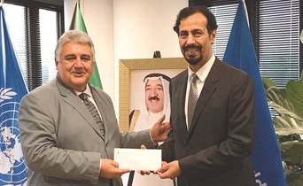 أمير عبدالله والسفير الشيخ علي الخالد خلال الاحتفال بالذكرى الرابعة لتكريم الأمم المتحدة لصاحب السمو وتسمية سموه قائدا للعمل الإنساني﻿