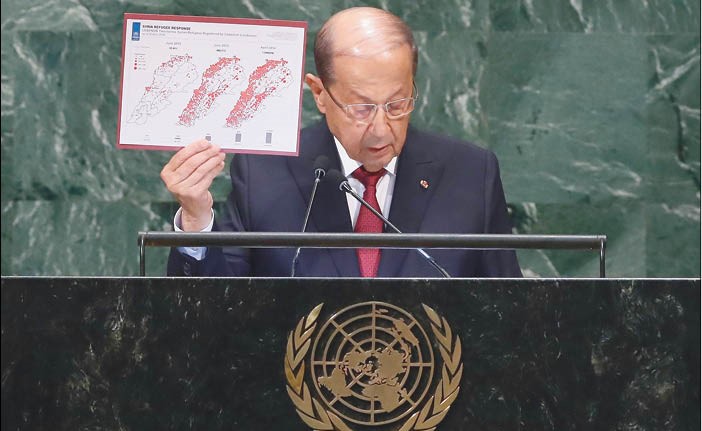  الرئيس اللبناني العماد ميشال عون يحمل مخططا زمنيا لنمو اعداد اللاجئين السوريين في لبنان	(أ.ف.پ)