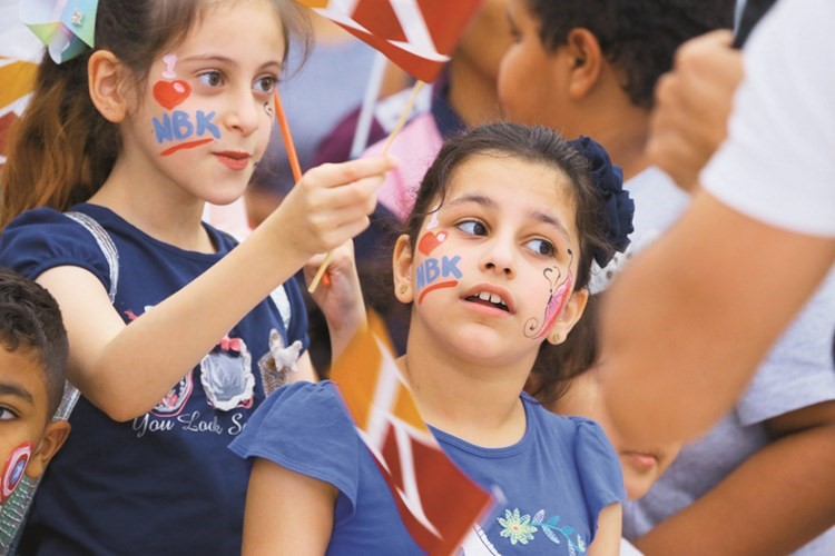  أطفال خلال المشاركة في الفعالية﻿