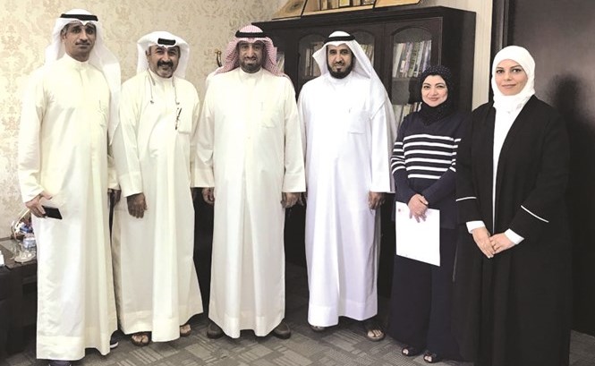د. ناصر العجمي خلال استقباله د. احمد الشطي ﻿
