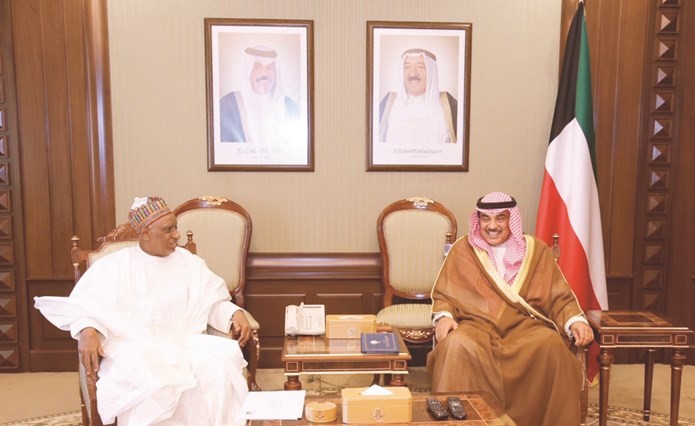 وزير الخارجية الشيخ صباح الخالد لدى استقباله مبعوث رئيس جمهورية النيجر د.حامد الغابد ﻿