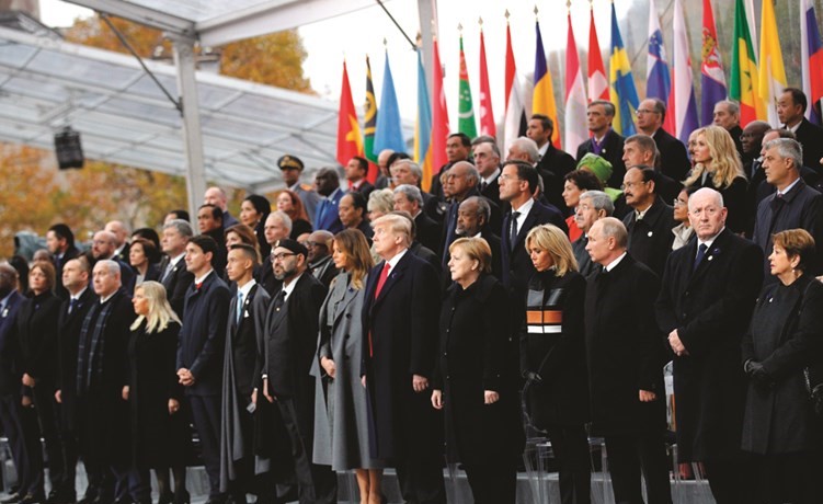 ﻿عدد من قادة العالم خلال الاحتفال بمئوية نهاية الحرب العالمية الأولى قي باريس أمس	(أ.ف.پ) ﻿