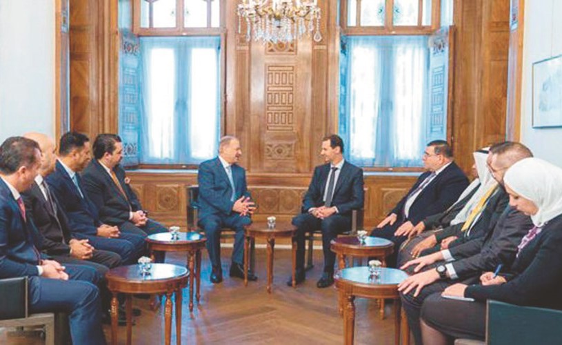 الرئيس بشار الأسد مستقبلا الوفد البرلماني الأردني- (سانا)﻿