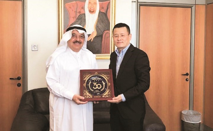 أحمد عبدالعزيز المطوع وبيل دينغ﻿
