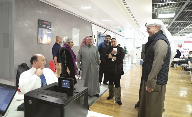 مجبل الأيوب وفادي قعوار مع موظفي الشركة ﻿