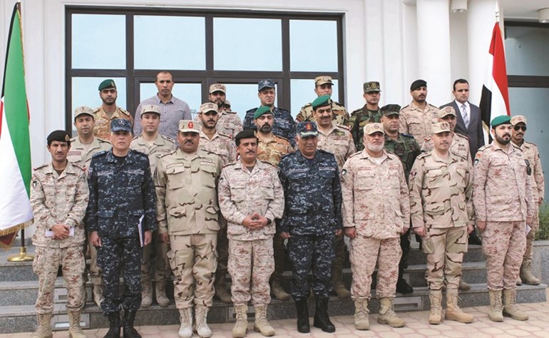المشاركون في اجتماع قاعة الأوسمة في لقطة جماعية﻿