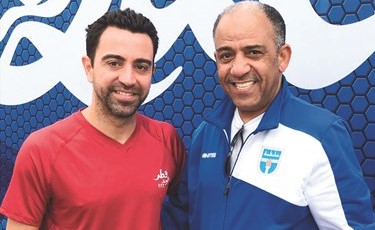 منصور التنيب وتشافي هيرنانديز﻿