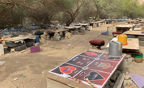 الأمن الجنائي يضبط 14 آسيوياً يلعبون القمار بإحدى الساحات الترابية بالمهبولة