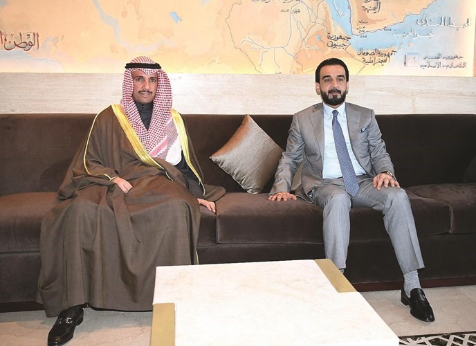 الغانم خلال لقائه محمد الحلبوسي﻿