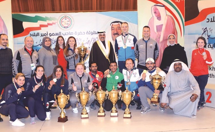 دعيج العتيبي يتوسط أبطال الرماية﻿