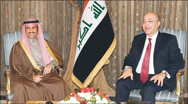 الرئيس العراقي د.برهم صالح لدى استقباله رئيس مجلس الأمة مرزوق الغانم