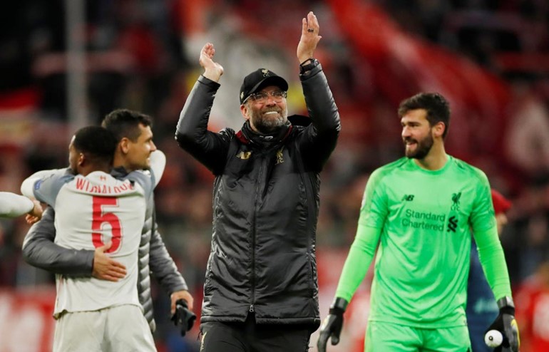 ليفربول يقهر كببر ألمانيا بثلاثية في عقر داره