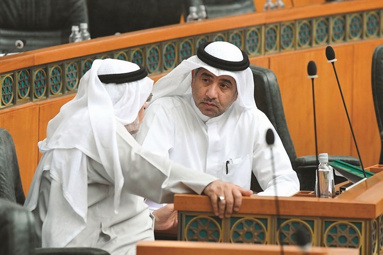 د.عودة الرويعي وعدنان عبدالصمد﻿