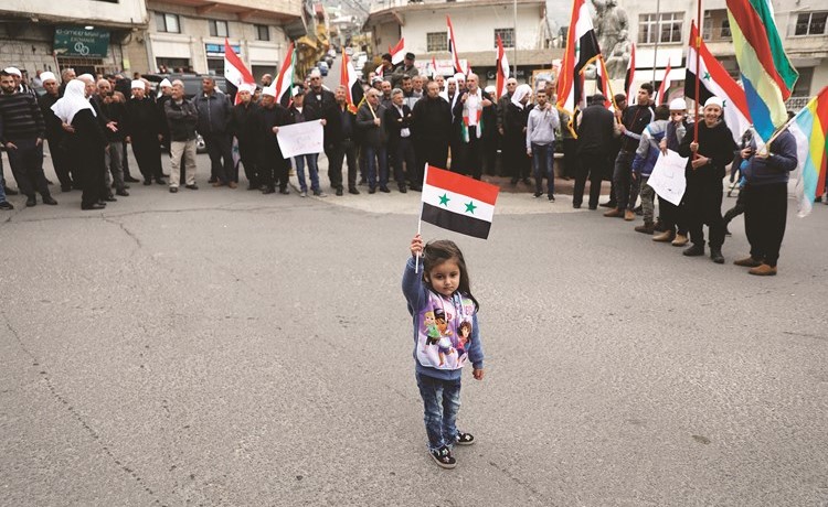 دروز الجولان في مظاهرة ضد قرار ترامب الاعتراف بسيادة اسرائيل على المرتفعات	(رويترز) ﻿