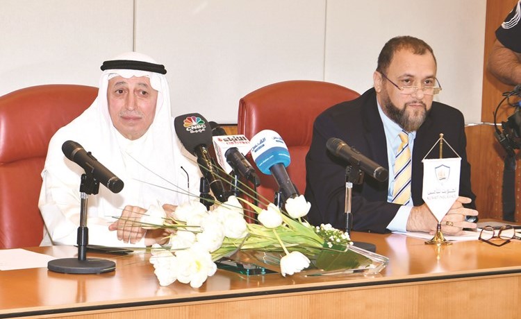 علي بهبهاني وسامي شريف خلال عمومية الكويت للتأمين	(قاسم باشا)﻿