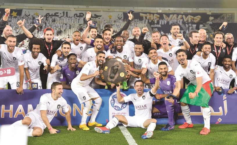 درع الدوري القطري في قبضة لاعبي السد ﻿