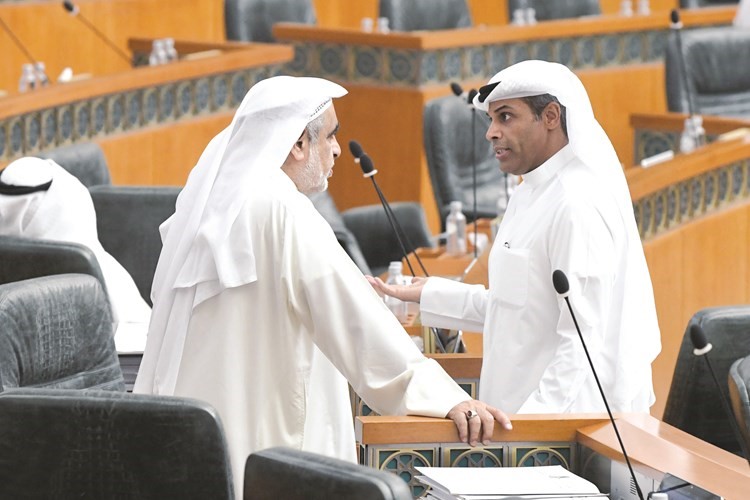 د.خالد الفاضل وعدنان عبدالصمد﻿