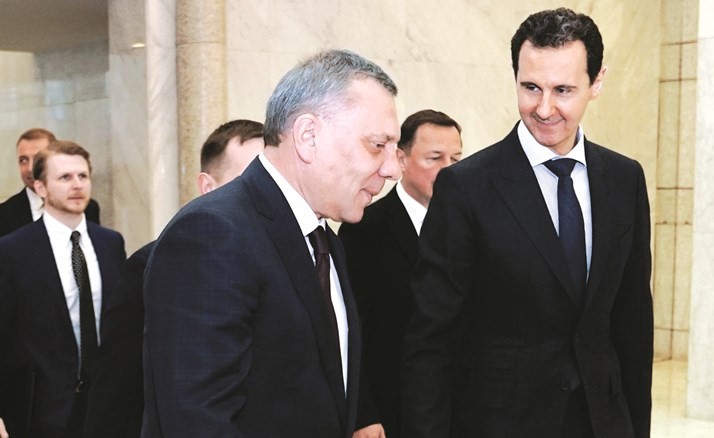 ﻿الرئيس بشار الأسد مستقبلا نائب رئيس الوزراء الروسي يوري بوريسوف	(رويترز)﻿