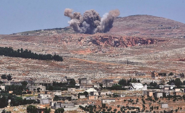 جانب من قصف الجيش السوري لمنطقة جبل شحشبو        (أ.ف.پ)﻿