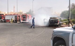  ورجال الإطفاء خلال التعامل مع الحريق﻿