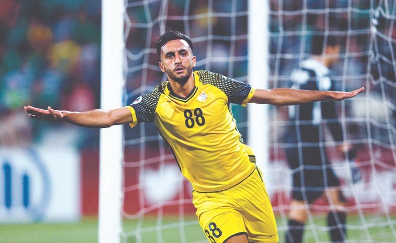 محمد قدوح محتفلا بتسجيل هدفه في الوحدات ﻿