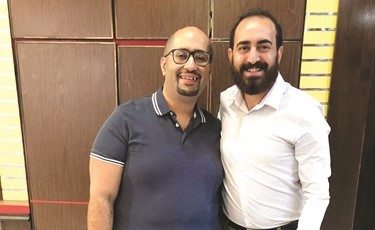 بطل الفيلم بيبو سعيد مع المخرج تامر حنا﻿