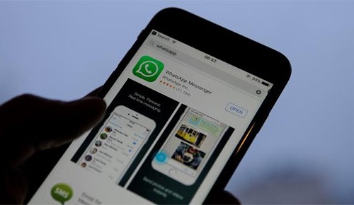 "واتساب" يختبر مشاركة الستاتوس على فيسبوك وإنستغرام