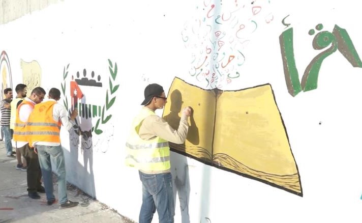 بالفيديو.. أكبر جدارية للغة العربية بالأردن