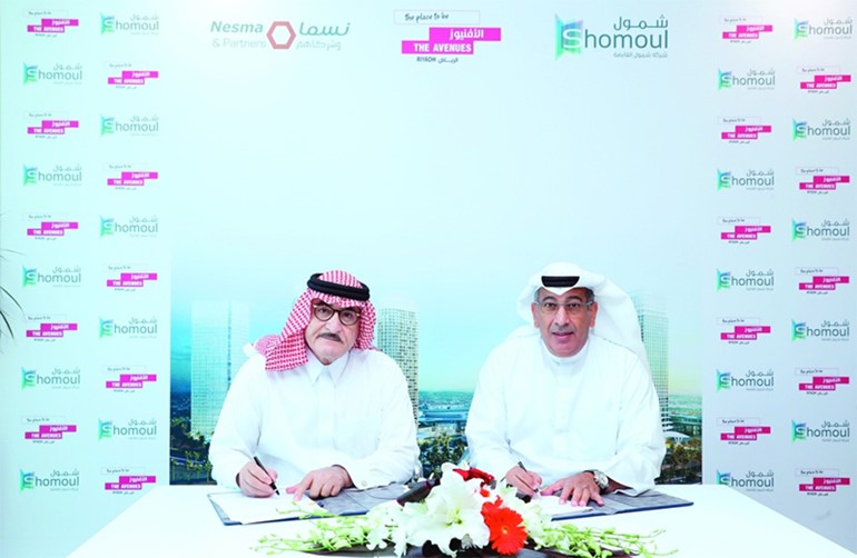 وليد الشريعان وعبدالعزيز بن علي التركي خلال توقيع مذكرة التفاهم