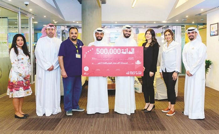 فريق الخليج وإذاعة نبض الكويت بعد الإعلان عن الفائز﻿