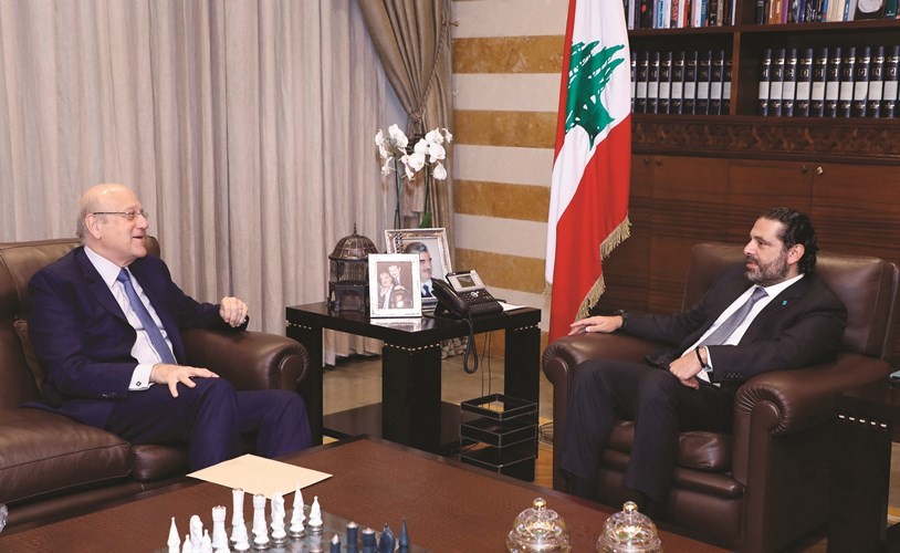 رئيس مجلس الوزراء سعد الحريري مستقبلا الرئيس نجيب ميقاتي في بيت الوسط	(محمود الطويل)﻿