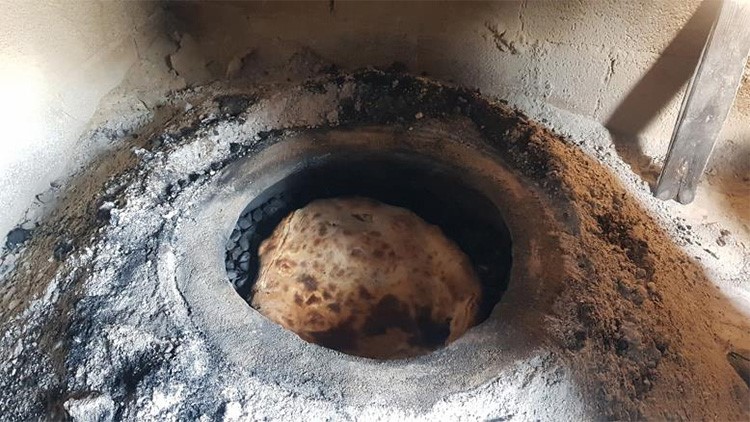 بالفيديو.. فلسطين.. حكاية خبز الطابون من البداية