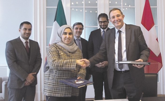 جانب من توقيع اتفاقية تجنب الازدواج الضريبي بين الكويت وسويسرا ﻿