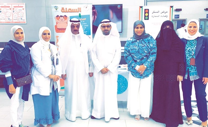 صورة جماعية للمشاركين في الاحتفال﻿