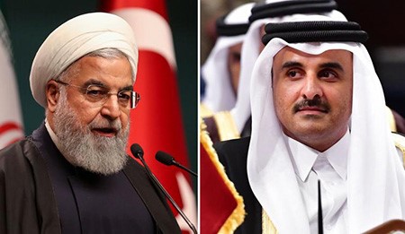 أمير قطر الشيخ تميم بن حمد والرئيس الإيراني حسن روحاني 