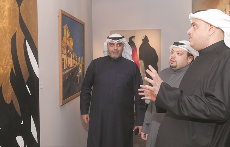 خالد الخالد وسليمان الرفاعي وحسين دكسن في المعرض