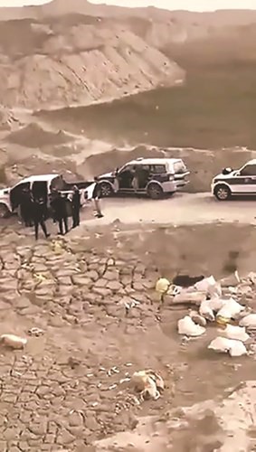 صورة أرشيفية لدوريات الأمن في مكان التخلص من الجثة