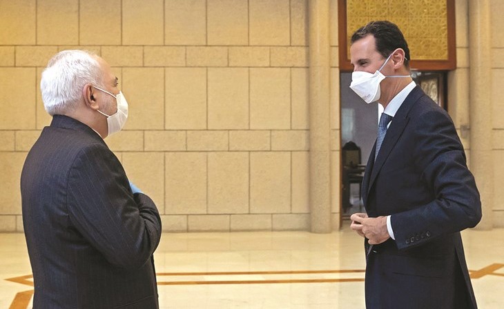 صورة نشرتها صفحة الرئاسة السورية للرئيس بشار الأسد مستقبلا وزير خارجية إيران محمد جواد ظريف