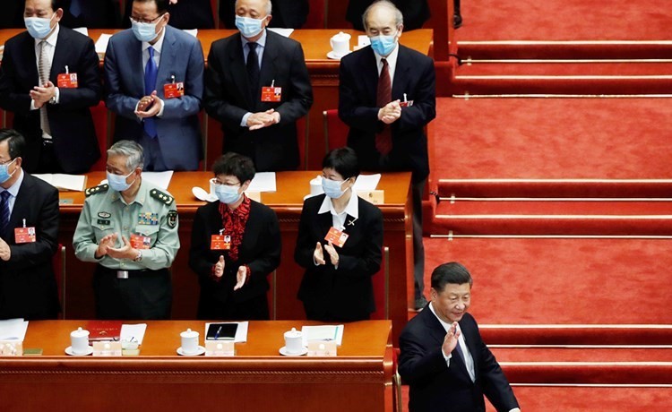 الرئيس الصيني شي جينبينغ في افتتاح المؤتمر الاستشاري السياسي في بكين امس (رويترز)