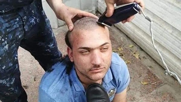 انتقدهم فحلقوا شعره وأذلوه.. فيديو يثير ضجة في العراق