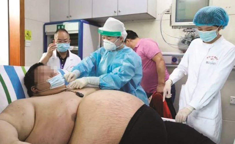 رجل صيني زاد وزنه 224 رطلا خلال 5 أشهر بسبب كورونا