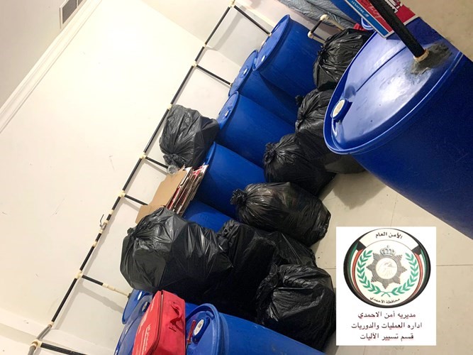 كرتون مياه صحة يقود لكشف شقة تحولت إلى مصنع خمور