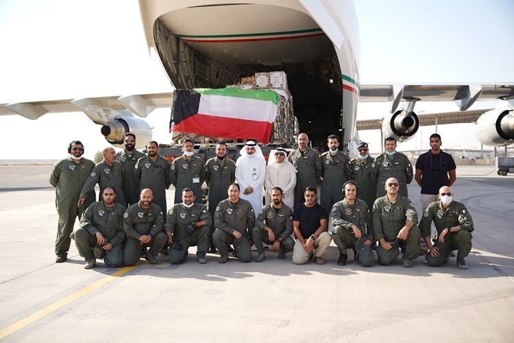 فريق العمل من وزارات الخارجية والدفاع والتجارة وشركة المطاحن الكويتية